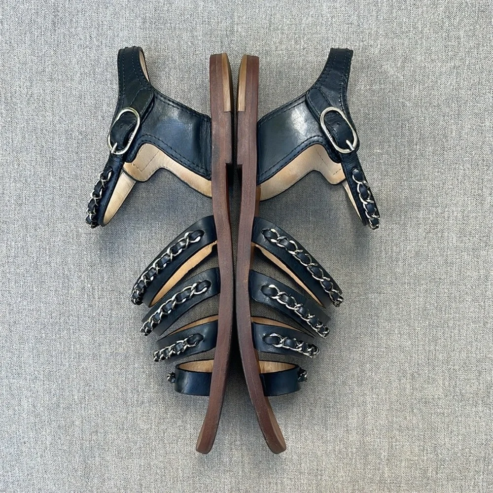 CHANEL Strappy Flat Sandal in Black Leather and Silver Chain Detail